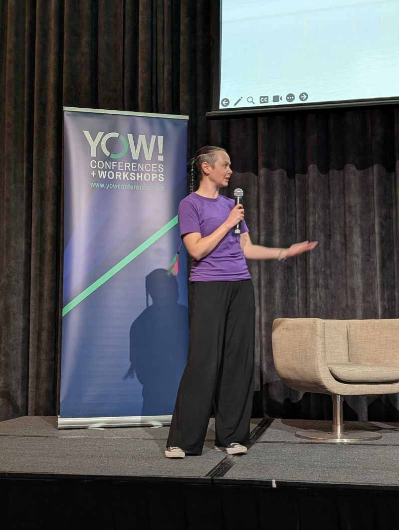 Susan Brander MCing at YOW! Melbourne 2025